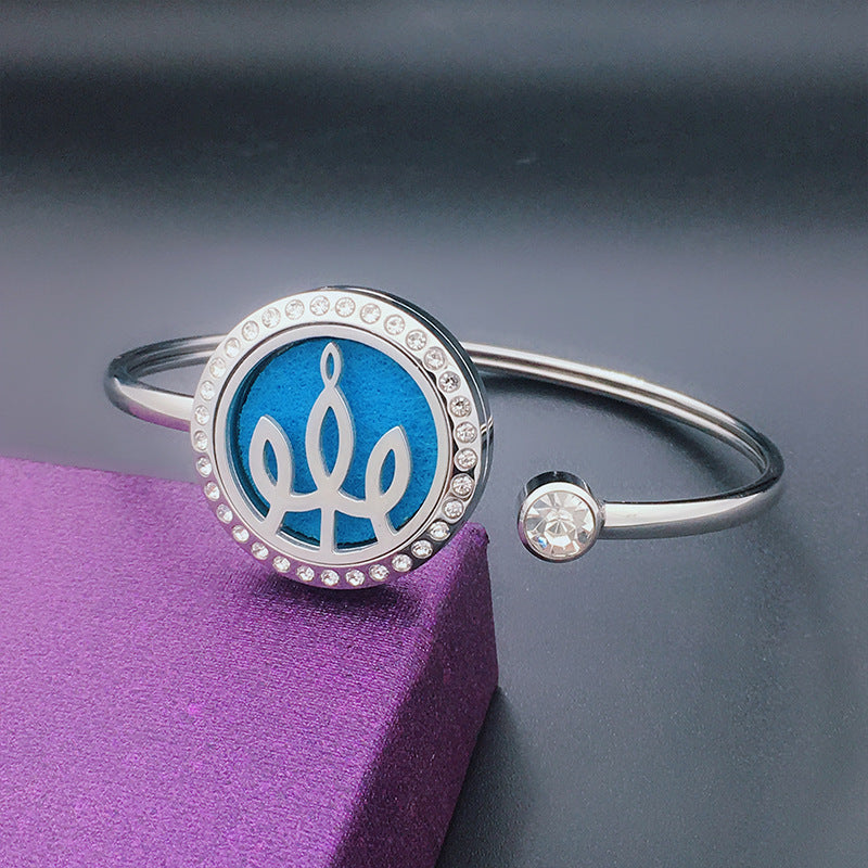 Stainless Steel Aromatherapy Bangle with Laser Etched Designs and Crystal Accents