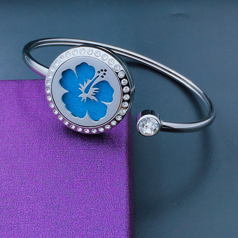 Stainless Steel Aromatherapy Bangle with Laser Etched Designs and Crystal Accents