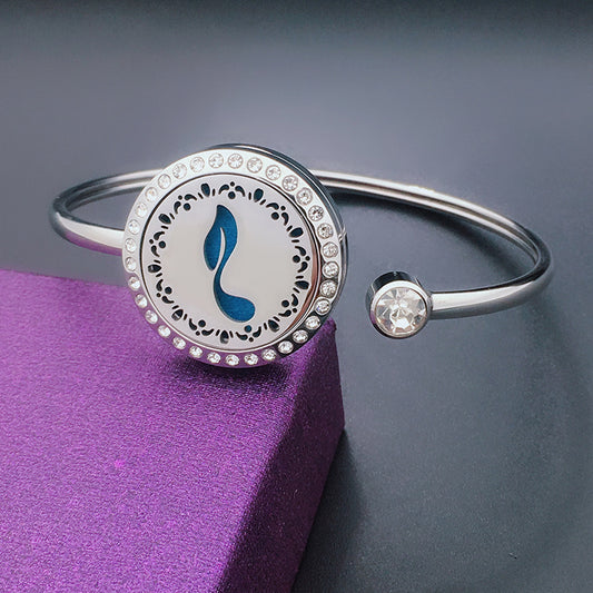 Stainless Steel Aromatherapy Bangle with Laser Etched Designs and Crystal Accents