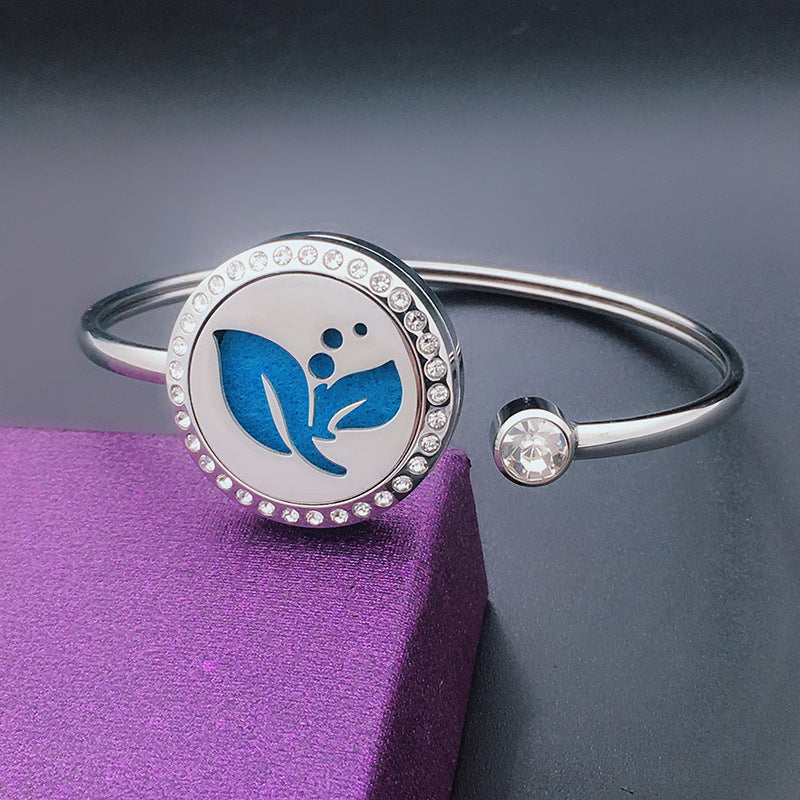 Stainless Steel Aromatherapy Bangle with Laser Etched Designs and Crystal Accents