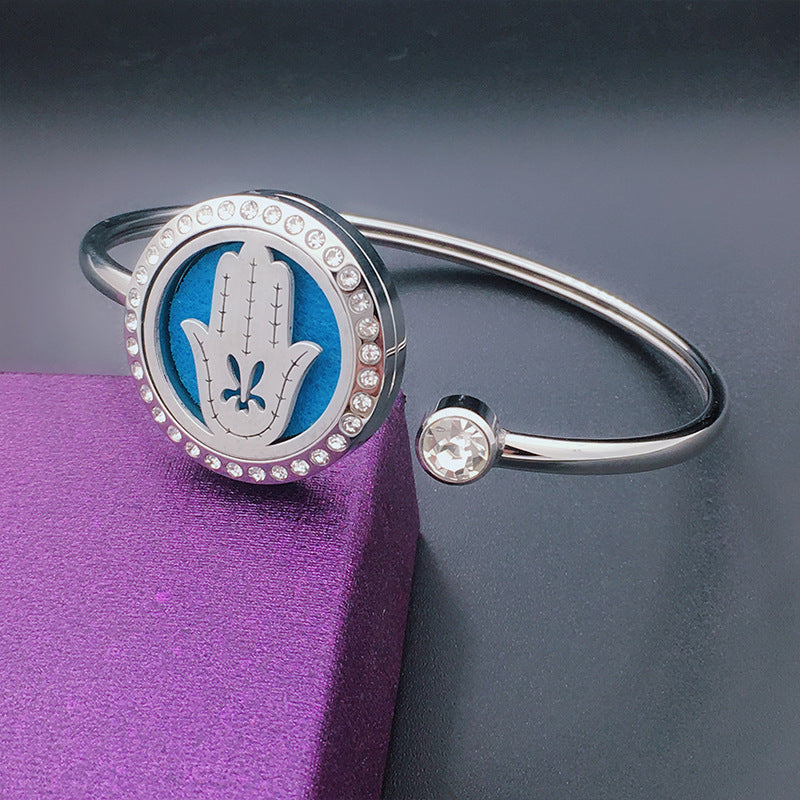 Stainless Steel Aromatherapy Bangle with Laser Etched Designs and Crystal Accents