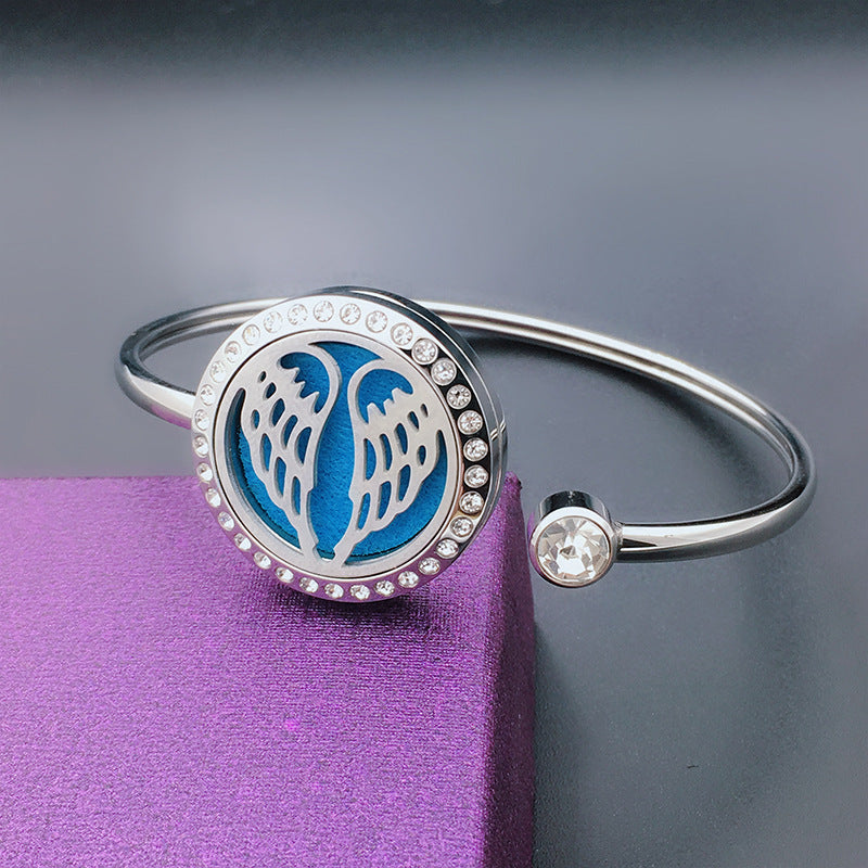 Stainless Steel Aromatherapy Bangle with Laser Etched Designs and Crystal Accents